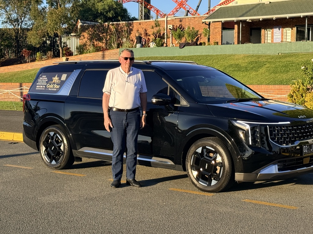 John Fitzgerald, owner and driver of Gold Star Transfers, with the Kia Carnival